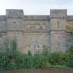 Detail of NE face of W wing showing venetian window to original kitchen