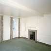 Interior. Ground floor View of bedroom 1 in E wing from NE showing 18th century fireplace and panelling