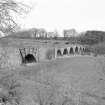 Oblique view from W, showing the entire SW side of the bridge