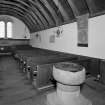 Interior. View of nave showing pews