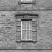 Detail of second floor  facade window.