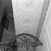 Interior, detail of West tower staircase plaster ceiling and ironwork