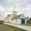 General view of coastguard station and houses from SE