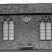 Detail of S windows showing circular window behind pulpit