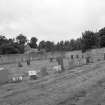 View of  graveyard in former manse walled garden from ENE