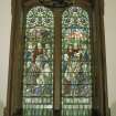Interior. Detail of stained glass window in N aisle dated 1914