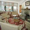 Interior.
Lounge, view from NNE looking through glazed screen to dining room.