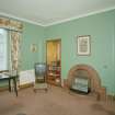 Interior.
Private sitting room, view from NW showing 1930's brick fireplace.
