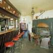 Interior.
Willie Wastle's bar, view from ESE showing fireplace and bar with original 1930's 'Swiss' furniture.