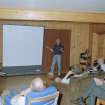 RCAHMS Muck Survey. Steve Boyle giving a talk on the archaeology of the Small Isles in Port Mor House.