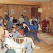 RCAHMS Muck Survey. Angela Gannon giving a talk on the archaeology of the Small Isles in Port Mor House.