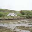 Muck, Port Mor. Port Mor House Hotel and building (NM 4208 7938) on terrace above. View from SE.