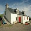 Muck, Port Mor, Pier Cottage. Cottage and gear store. View from NNW.