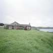 Muck, Gallanach, New House. Bungalow. View of front elevation from NE.