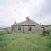 Muck, Gallanach, New House. Bungalow. View of rear elevation from SW.