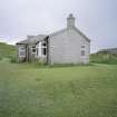 Muck, Gallanach, New House. Bungalow. View of side elevation from NW.