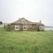 Muck, Gallanach, New House. Bungalow. View of front elevation from E.