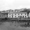 View of offices at S end of yard from WNW