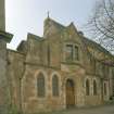 View of church hall from NE showing entrance with oriel window above.