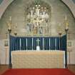 Interior. Altar from W  showing angel topped riddel posts by J Ninian Comper of 1903 and 15th century chandelier