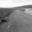 View of S harbour wall from E