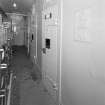 Interior. View of basement cells corridor