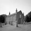 General View from NE showing church and rear entrance.