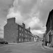 View from SSE showing section from junction with John Street and Ladybridge Street.