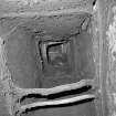 Interior. Detail inside chimney flue