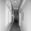 Interior. View of first floor corridor outside rooms 100-106