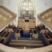 Interior. 
View from gallery looking towards the pulpit showing the steeply raked seating.