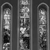 Detail of stained glass in North transept by Oscar Paterson depicting the Nativity 1912