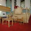 Interior. View showing pulpit, communion table and chairs