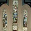 Interior. View of the three North stained glass windows by A Ballantine & Gardiner 1897 depicting the Nativity, Resurrection and Ascension