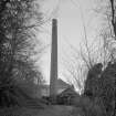 View from N of N gable of boiler house (at N end of mill), with chimney