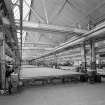 Interior.  General view of large finishing tables in paper trade products area, previously part of the Broadloom Department