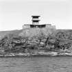 View from S in Switha Sound showing World War II Battery Observation Post and twin 6-pounder gun-emplacement.