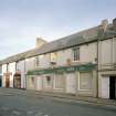 General view from S of bakery, including shop frontage.