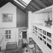 Interior. 
Elevated view from stair, overlooking baking area at ground floor level and pie-crust gallery to right.