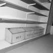 Interior. 
Detail of storage boxes in the bakery shop.