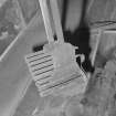 Interior. 
Detail of rack above Oven No. 2 supporting two peels which were used to take baking trays in and out of the ovens.