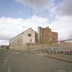 View from S showing former stationery warehouse (left) fronting onto Fordneuk Street, and former cotton mill behind (right)