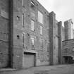 View of courtyard area from NW, showing part of former cotton mill