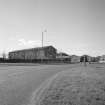 View from E of large storage building