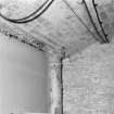 Interior. Detail in basement showing the fireproof brick vaulting supported on a frame of cast-iron beams and columns