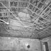 Interior. E end of top flat, view of light wrought-iron roof trusses
