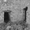 Detail of doorways to vaulted lower storey and turnpike stair in NW re-entrant angle.