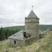 View from N, showing the central tower and wind vane, and its two adjacent 'pavilions'