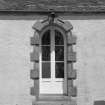 Detail of arched doorway in link to West Pavilion