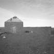 View of W pavilion and wall from E.